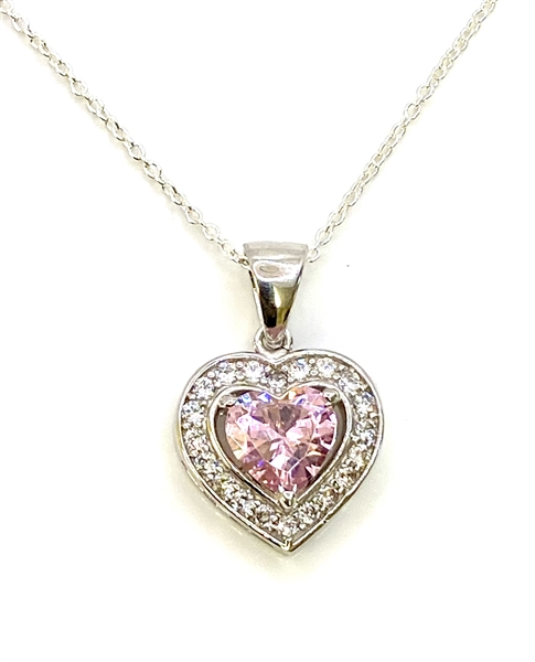 Heart shape Pink Essence stone in prong setting, is surrounded by round ...